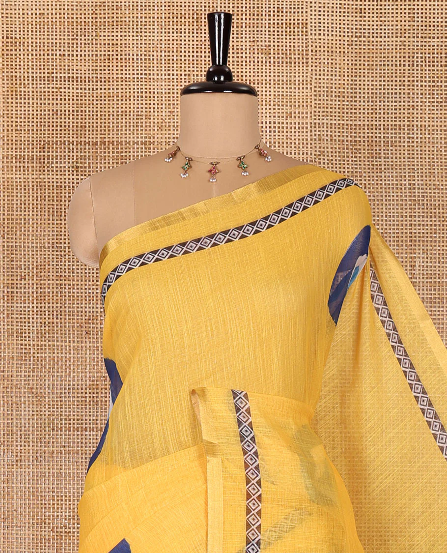 Yellow evil eye motifs printed linen cotton saree, diamond motifs printed with piping border, chevron printed pallu, and a matching blouse - Image 2