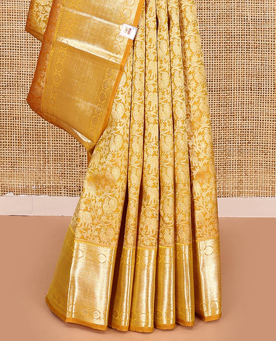 Yellow jacquard kanchipuram silk saree, zari border of rekku, neli, rudraksham, and jaal designs, and jaal pallu - Image 4