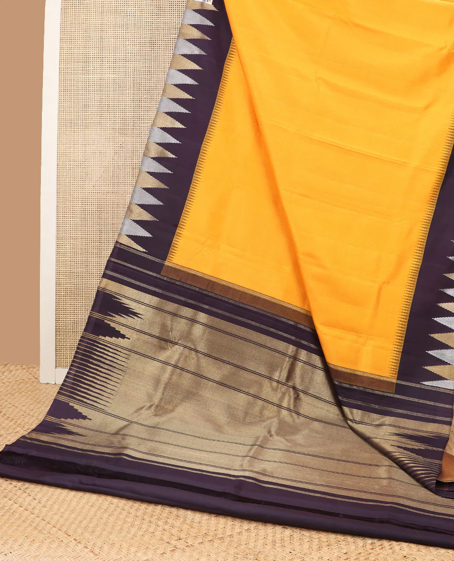 Yellow plain kancheepuram silk saree with contrast pillaiyar rekku korvai border, and pallu of pillaiyar mokku designs - Image 3