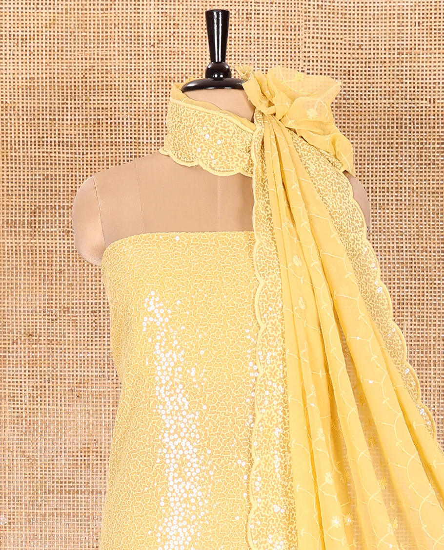 Yellow Material Chudidar Set Features Sequin Embroidered Georgette Top, a Plain American Crepe Bottom, and a Scallop Dupatta Embellished with Floral Vine Embroidery - Image 3