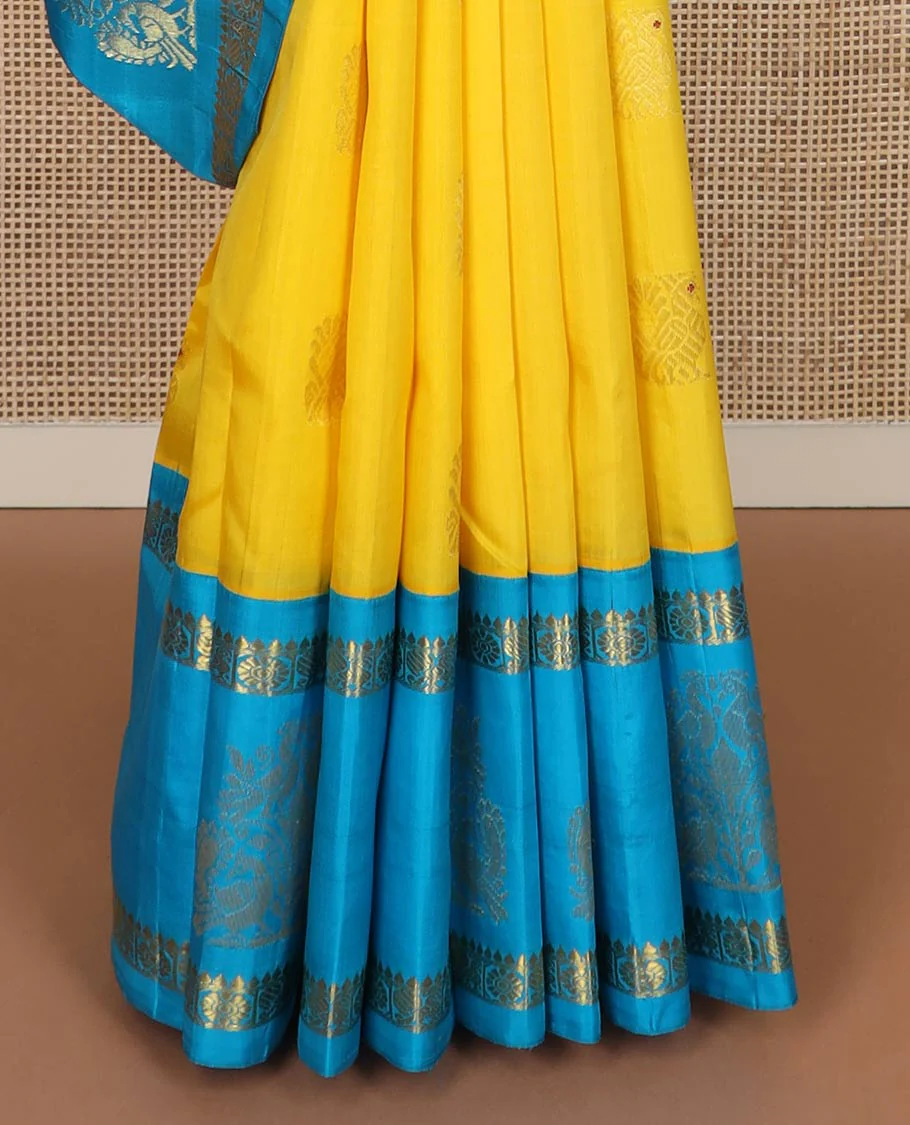 Yellow meena mayil buttas silk saree, contrast korvai one-sided border of thilakam,annam chakram & mayil designs & floral design pallu - Image 5