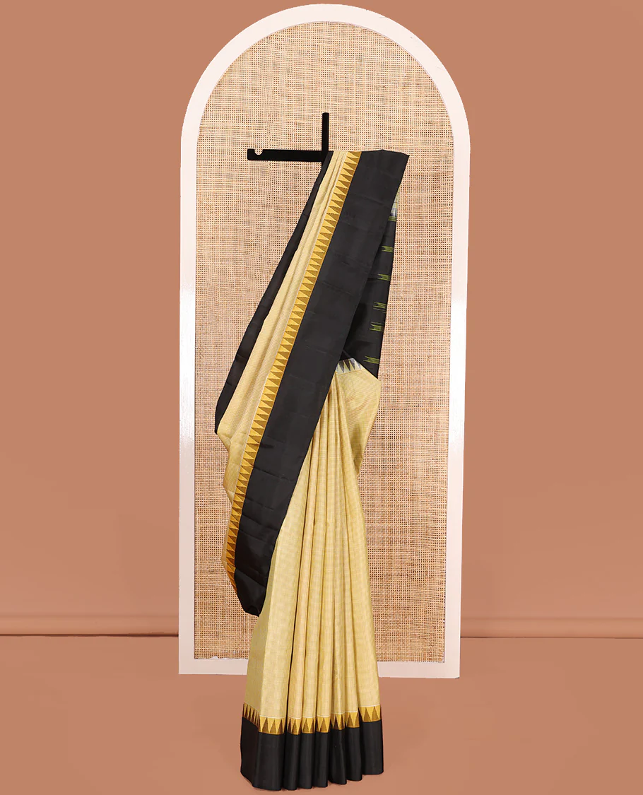 Yellow micro-checked Kanchipuram silk saree, contrast thazampoo rekku border, and striped pallu