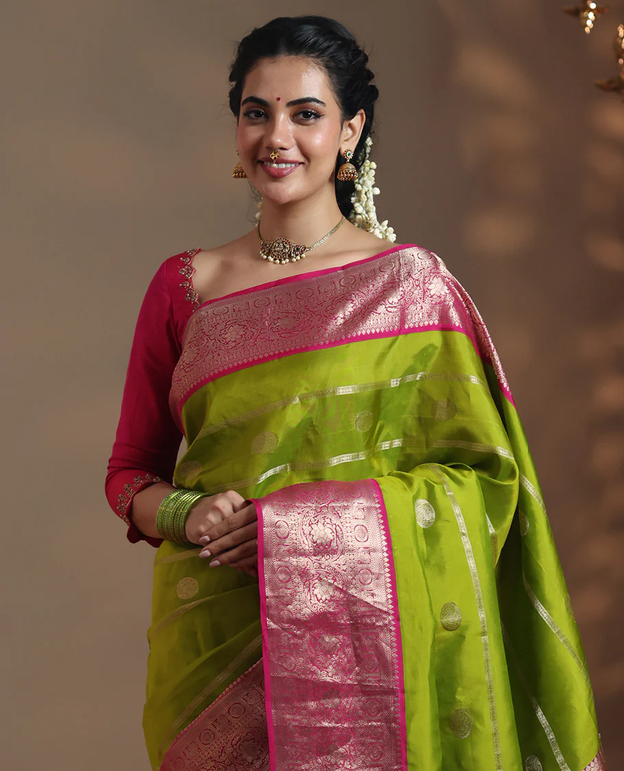 Parrot green veldhari and round kuthirai motifs Vasundhara silk saree, contrast border of thilakam mokku, muthu, annam chakram, and kodi visiry designs, floral design pallu, and zari design blouse - Image 4