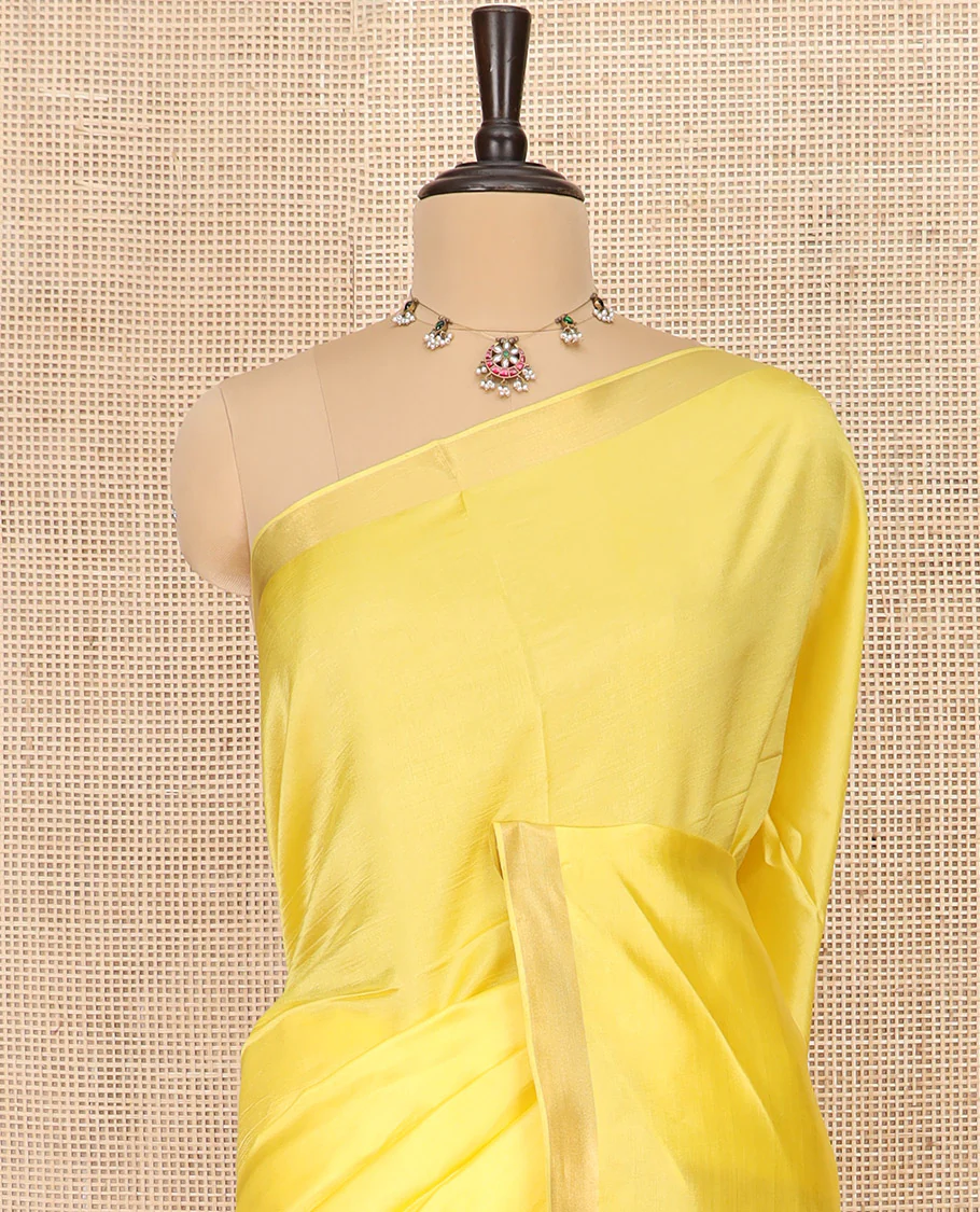Yellow Plain Banana Pith Saree Subtly Sparkled with Zari Bavanji Border, Gleaming Zari Stripes Woven Pallu, and Paired with a Matching Plain Blouse - Image 2