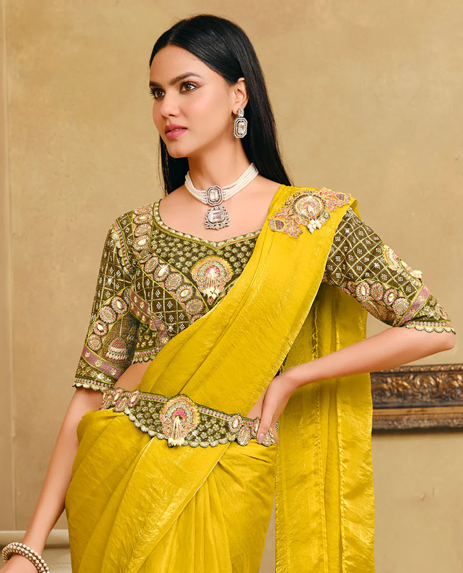 Yellow Plain Party Wear Designer Saree, Complemented with a Contrast Sweetheart Neck Heavy Embroidered Elbow Sleeve Readymade Blouse, Detachable Embroidered Belt, and a Free Embroidered Flap Sling Bag - Image 2