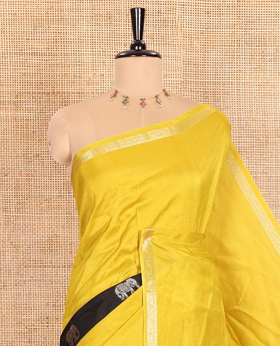 Yellow Russian Silk Saree Featuring Double-Sided Plain and Central Zari Elephant Motifs Weave, Accentuated by a Subtle Traditional Zari Border, Enhanced with a Zari-Designed Pallu, and Paired with a Blouse Depicting Meenakari Peacocks - Image 2