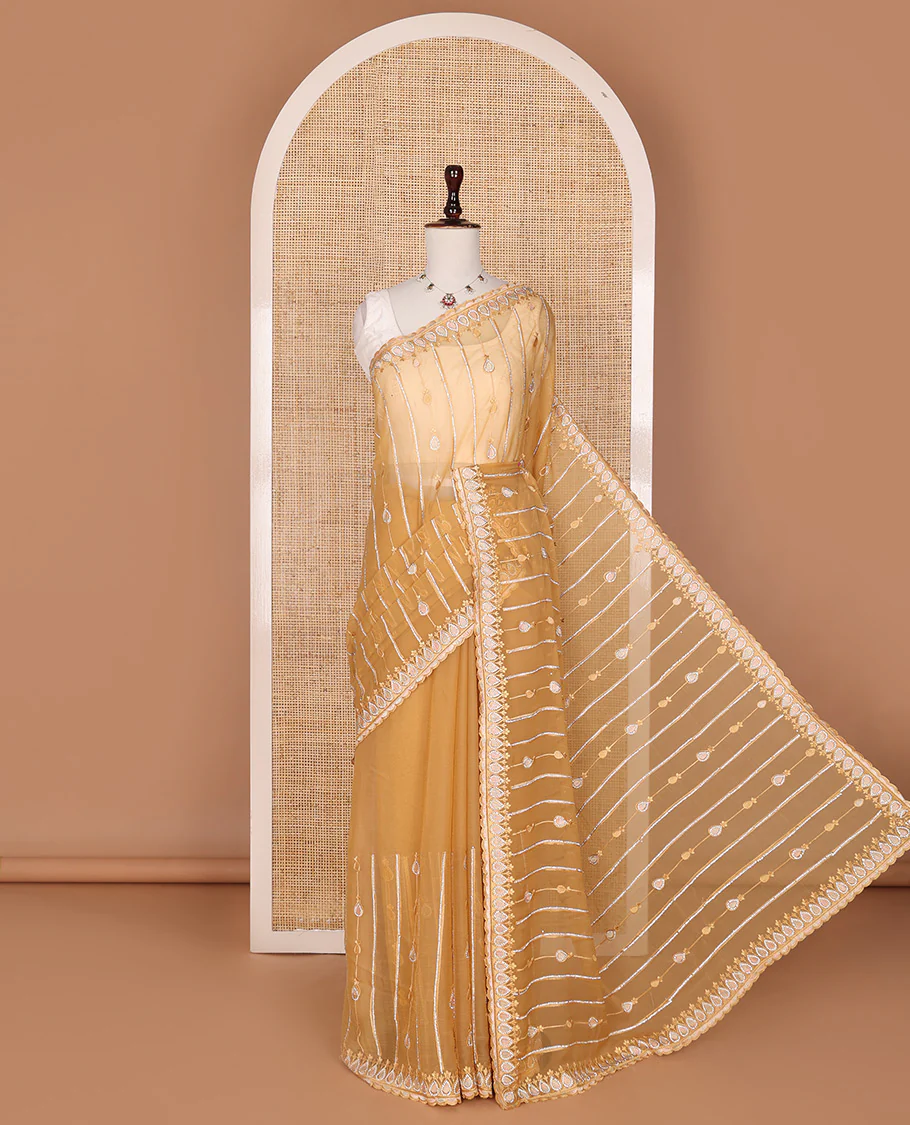 Yellow striped and thilakam stone-thread embroidered designer saree, scallop embroidered border