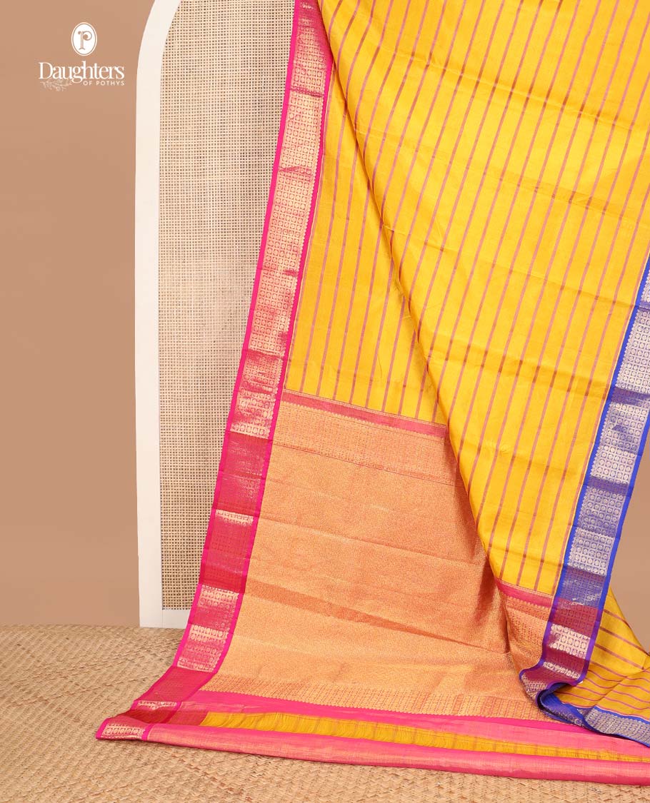 Yellow striped kanchipuram silk saree with contrast ganga jamuna border of thilakam mokku, banaras, paun design & zari design pallu - Image 3
