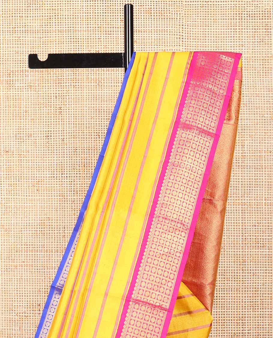 Yellow striped kanchipuram silk saree with contrast ganga jamuna border of thilakam mokku, banaras, paun design & zari design pallu - Image 4