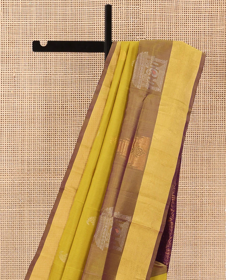Yellow Uppada Silk Saree Decked Up with Paisley Buttas, Subtle Contrast Border of Temple Gopuram Motifs, Captivating Pallu Featuring Floral Jaal Design, and Paired with a Contrast Blouse - Image 3