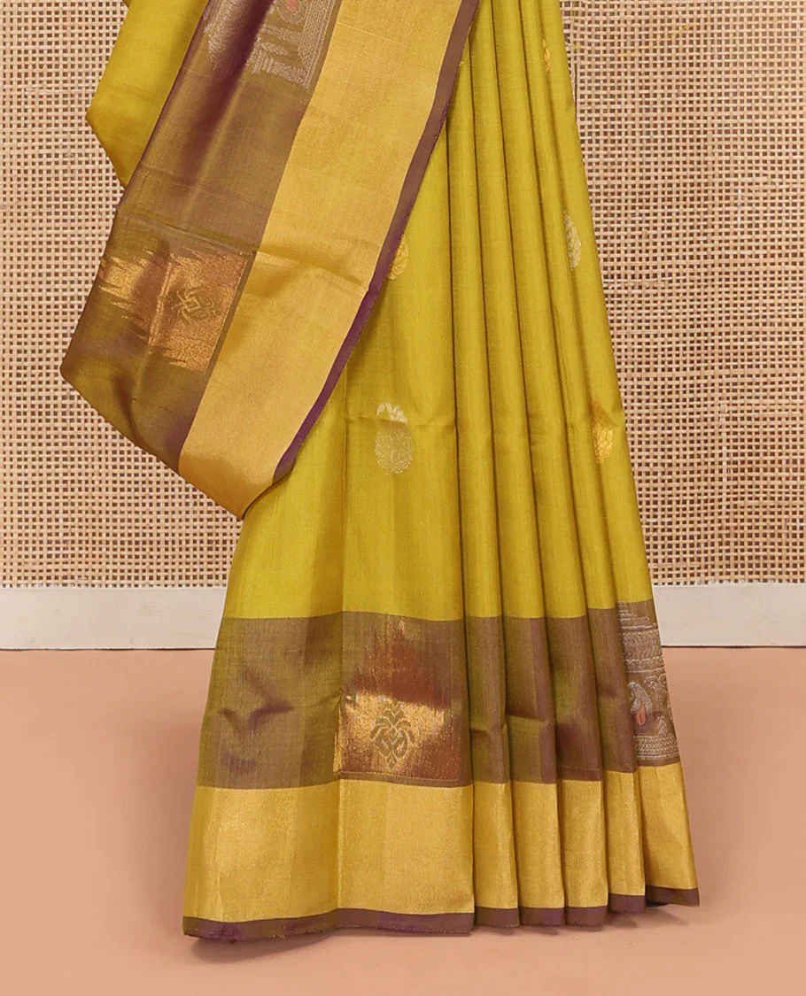 Yellow Uppada Silk Saree Decked Up with Paisley Buttas, Subtle Contrast Border of Temple Gopuram Motifs, Captivating Pallu Featuring Floral Jaal Design, and Paired with a Contrast Blouse - Image 4