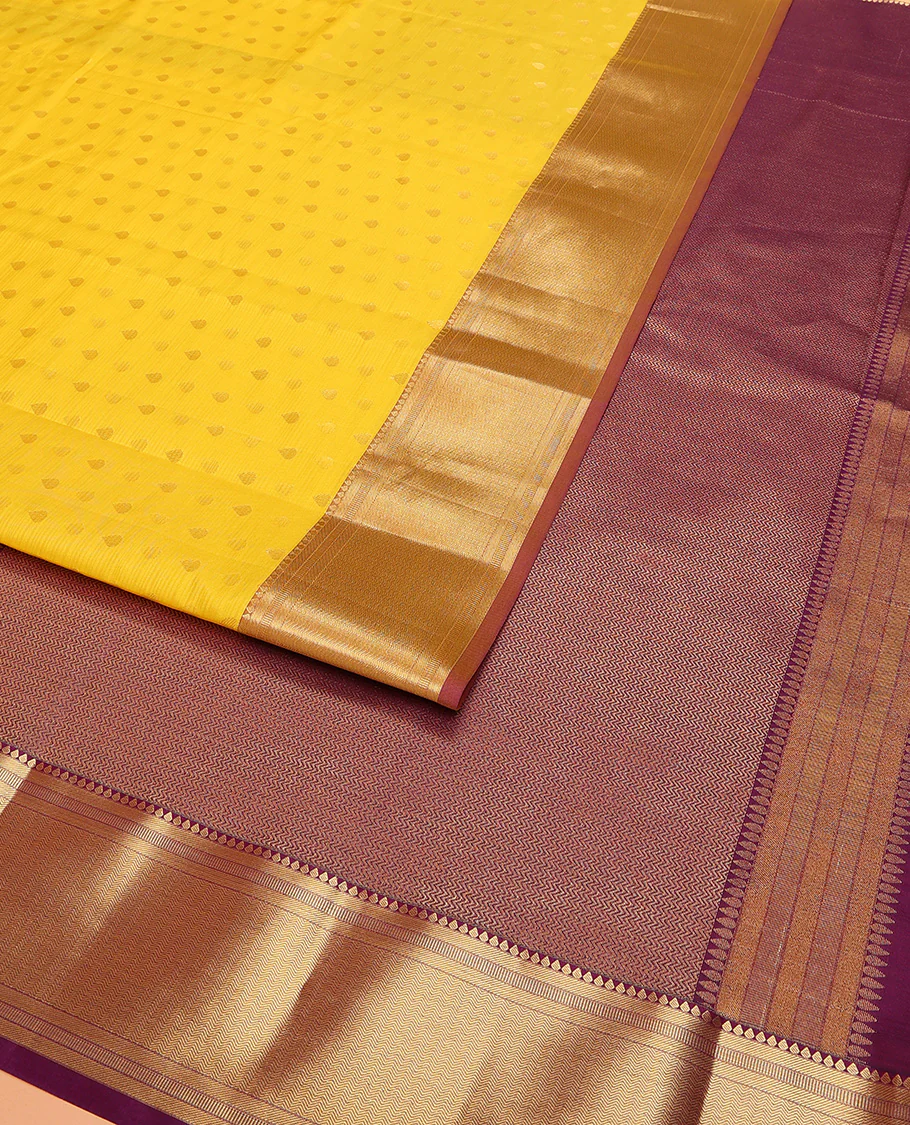 Yellow Vasundhara Lite Silk Mix Saree Decorated with Thilakam Buttas, Highlighted with Contrast Border Featuring Thilakam, Banaras, and Vanki Designs, Grandly Woven Pallu with Vanki Designs, and Paired with a Matching Blouse - Image 2