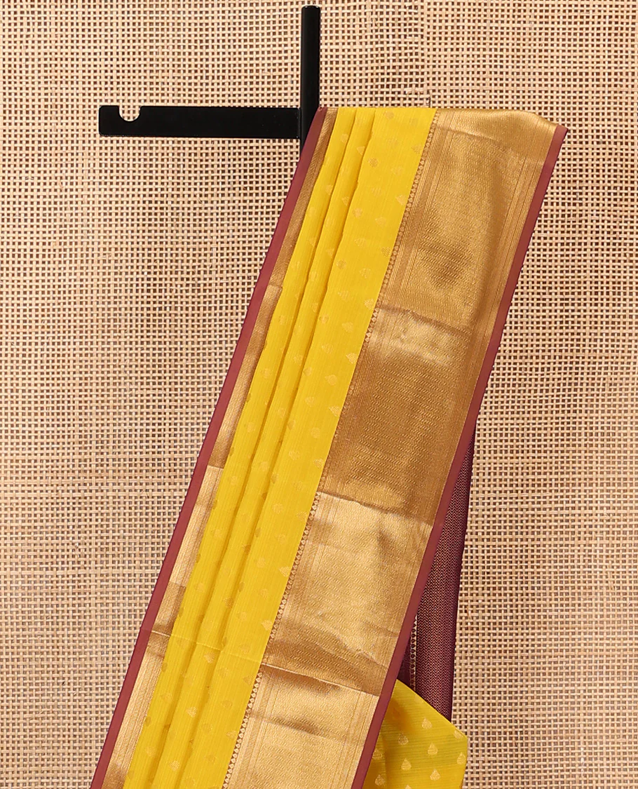 Yellow Vasundhara Lite Silk Mix Saree Decorated with Thilakam Buttas, Highlighted with Contrast Border Featuring Thilakam, Banaras, and Vanki Designs, Grandly Woven Pallu with Vanki Designs, and Paired with a Matching Blouse - Image 3