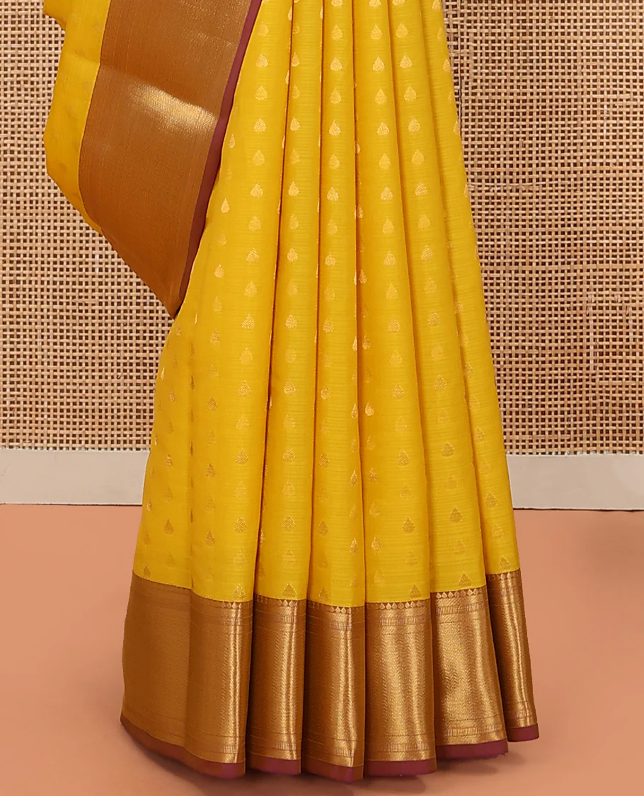 Yellow Vasundhara Lite Silk Mix Saree Decorated with Thilakam Buttas, Highlighted with Contrast Border Featuring Thilakam, Banaras, and Vanki Designs, Grandly Woven Pallu with Vanki Designs, and Paired with a Matching Blouse - Image 4