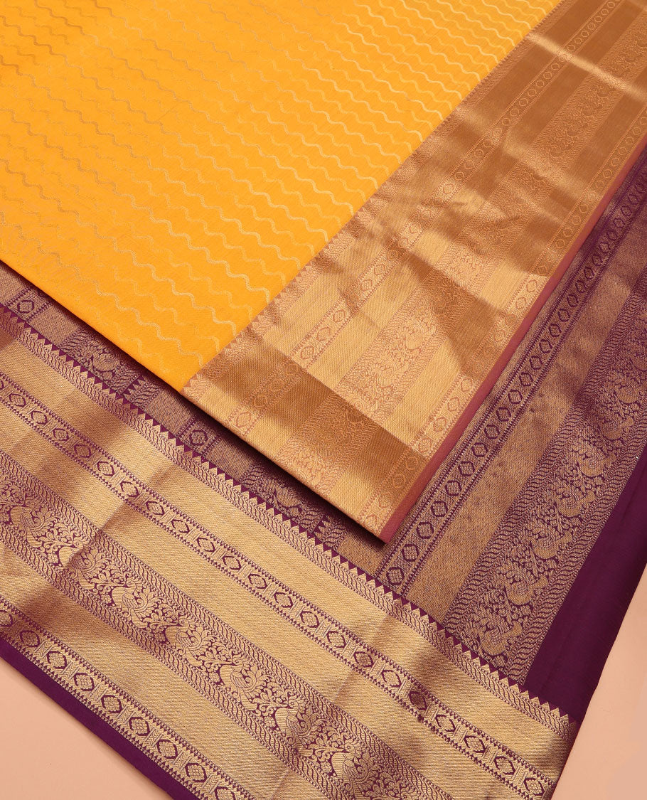 Yellow Vasundhara Lite Silk Mix Saree Highlighted by Zig-Zag Stripes, Featuring a Contrast Border of Rekku, Muthu, Puli Nagam, Laddu Kamalam, and Mayil Designs, Pallu Steeped with Traditional Zari Designs, and a Contrast Blouse - Image 2