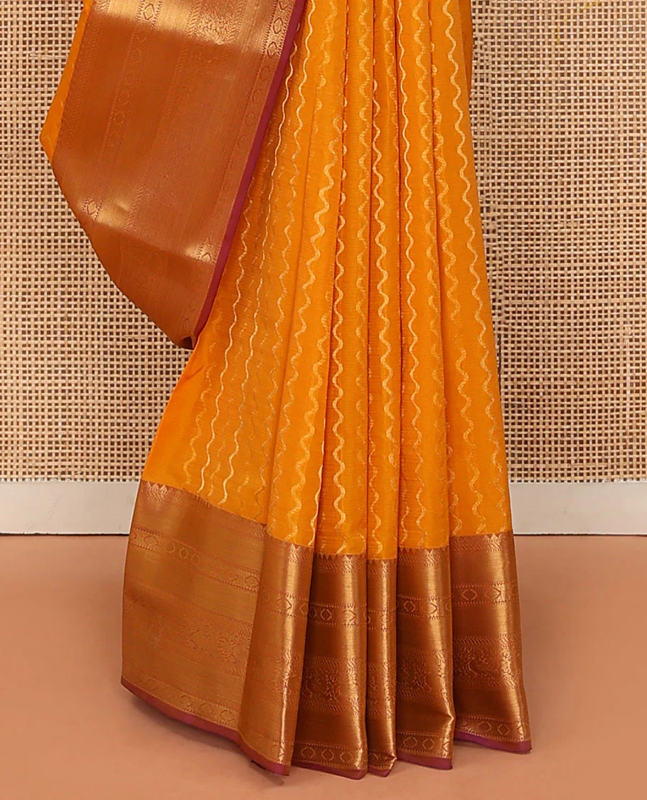 Yellow Vasundhara Lite Silk Mix Saree Highlighted by Zig-Zag Stripes, Featuring a Contrast Border of Rekku, Muthu, Puli Nagam, Laddu Kamalam, and Mayil Designs, Pallu Steeped with Traditional Zari Designs, and a Contrast Blouse - Image 4