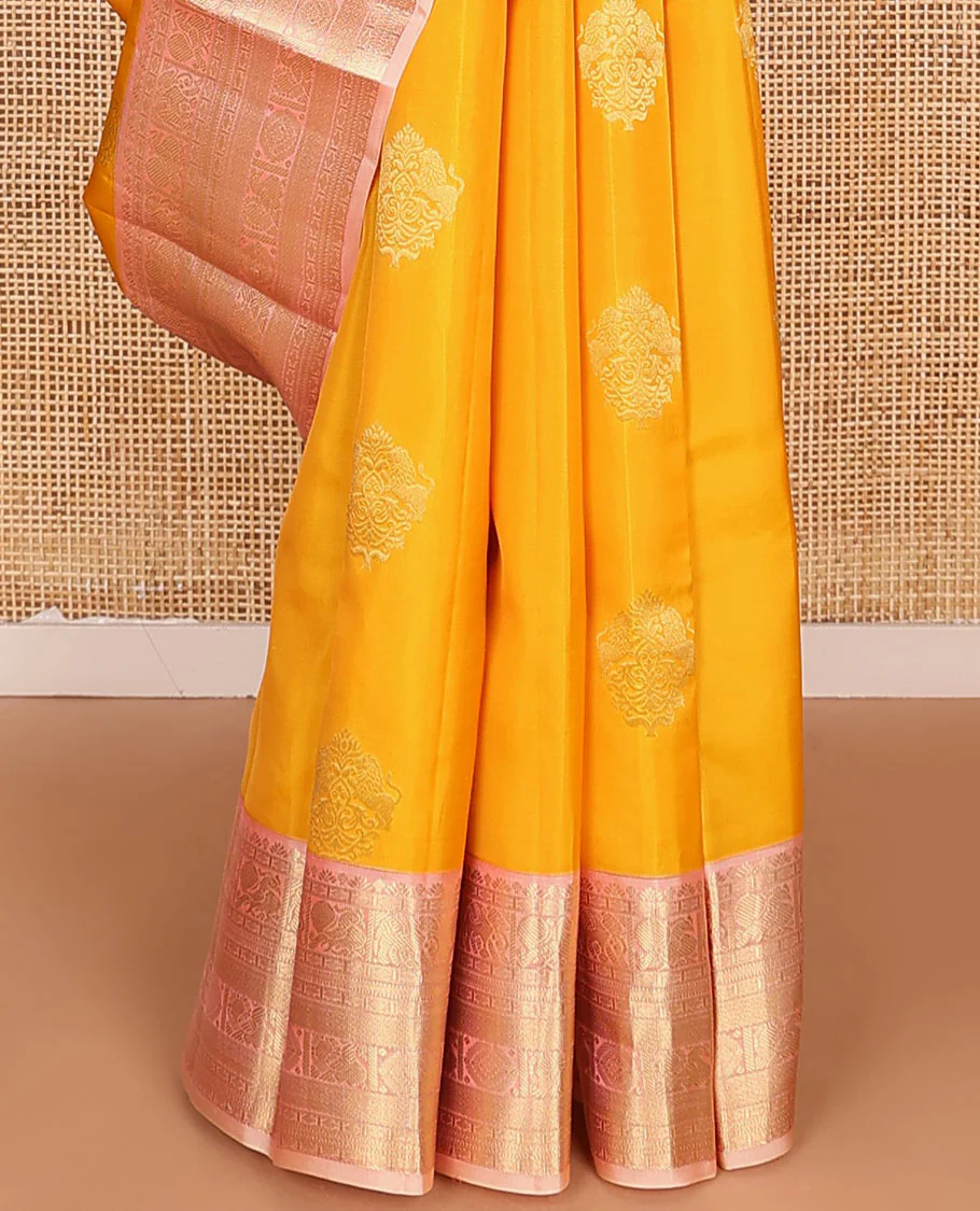 Yellow Vasundhara Lite Silk Mix Saree Ornamented with Singam Buttas, Complemented by a Contrast Border Featuring Yaanai, Mayil, Chakram, and Manga Designs, Intricately Zari Decked Up Pallu, and a Contrast Blouse - Image 4