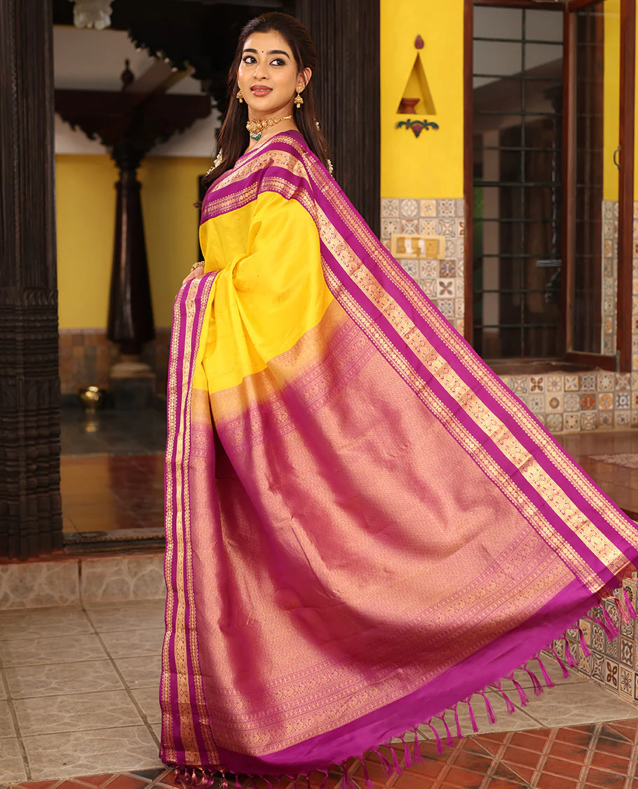 Yellow Vasundhara Silk Saree Finely Woven with Zari Buttas, Complemented with Varisai Pettu Border Featuring Rekku, Muthu, Banaras, Rudraksham, and Mayil Designs, Majestically Zari-Woven Pallu, and a Contrast Blouse - Image 6
