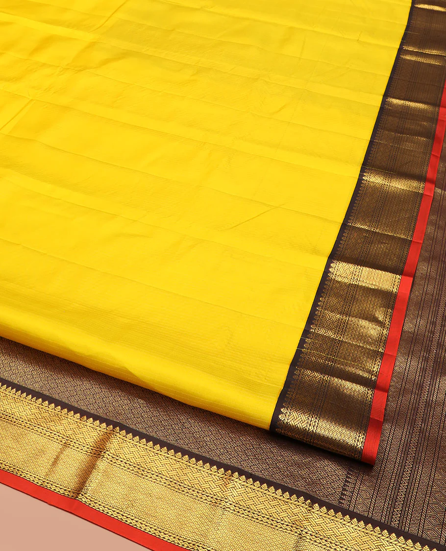 Yellow Vasundhara Silk Saree Subtly Woven in Stripes, Complemented with a Contrast Border Featuring Paiyaadi Kann, Neli, and Mayil Kann Design, Subtly Woven Pallu of Intricate Designs, and Paired with a Contrast Blouse - Image 2