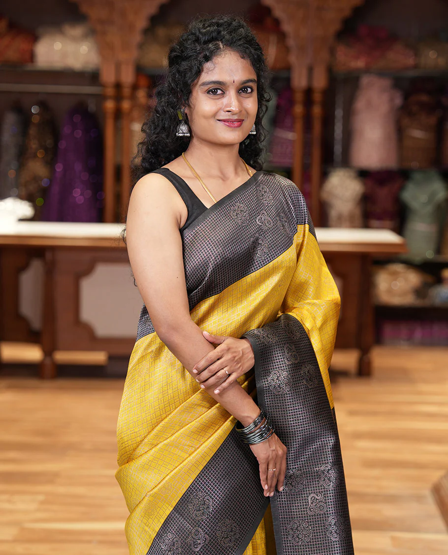 Yellow zari buttas and checked kanchi silk saree, contrast border of zari buttas, and checks, intricate pallu, and contrast zari bordered blouse - Image 2