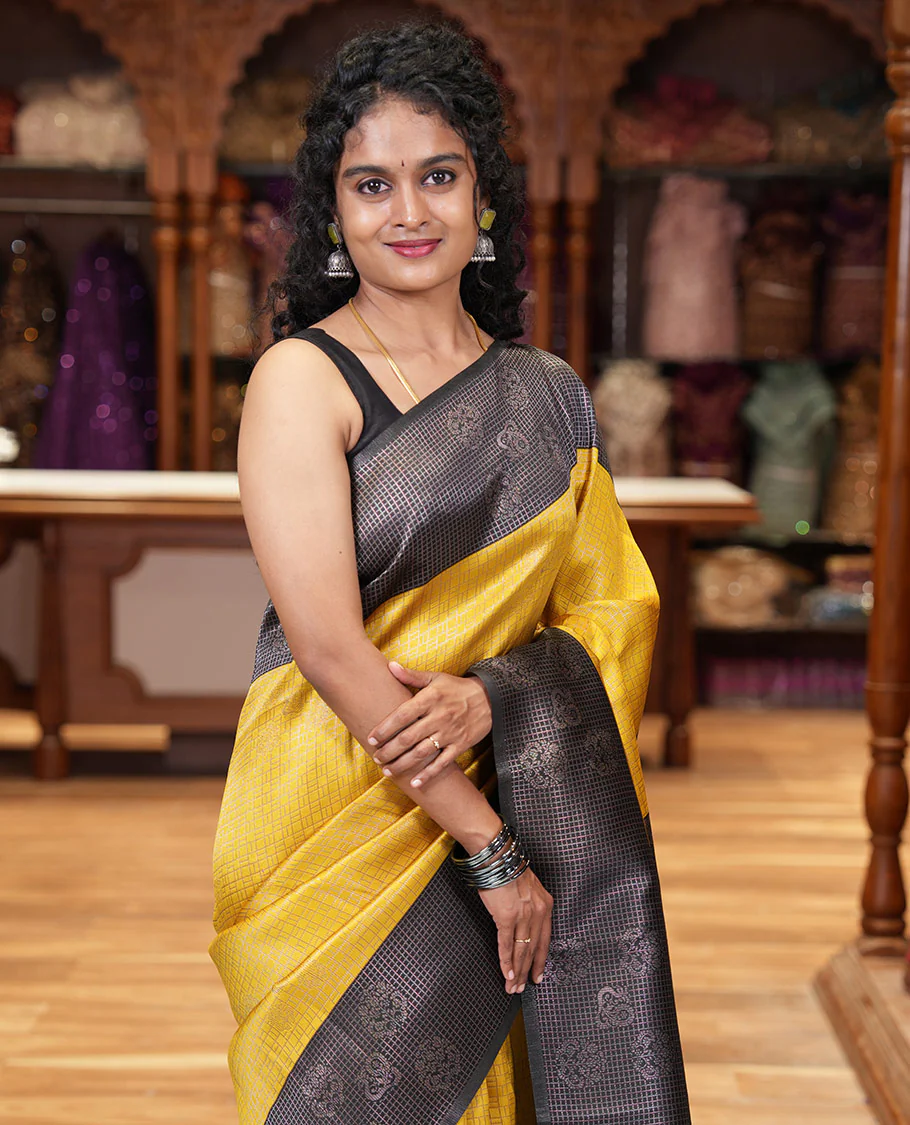 Yellow zari buttas and checked kanchi silk saree, contrast border of zari buttas, and checks, intricate pallu, and contrast zari bordered blouse - Image 3