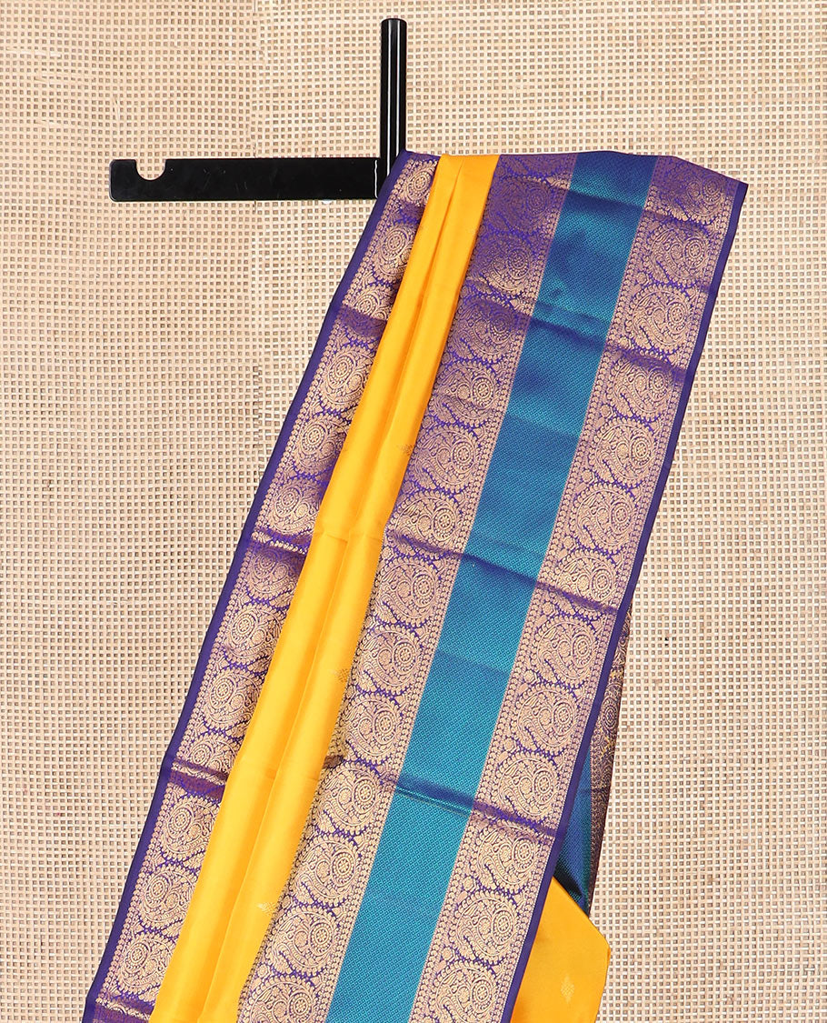 Yellow zari buttas Kanchipuram silk saree, contrast border of salangai, manga, muthu, arumbu manga, and mayil kann designs, and vanki pallu - Image 3
