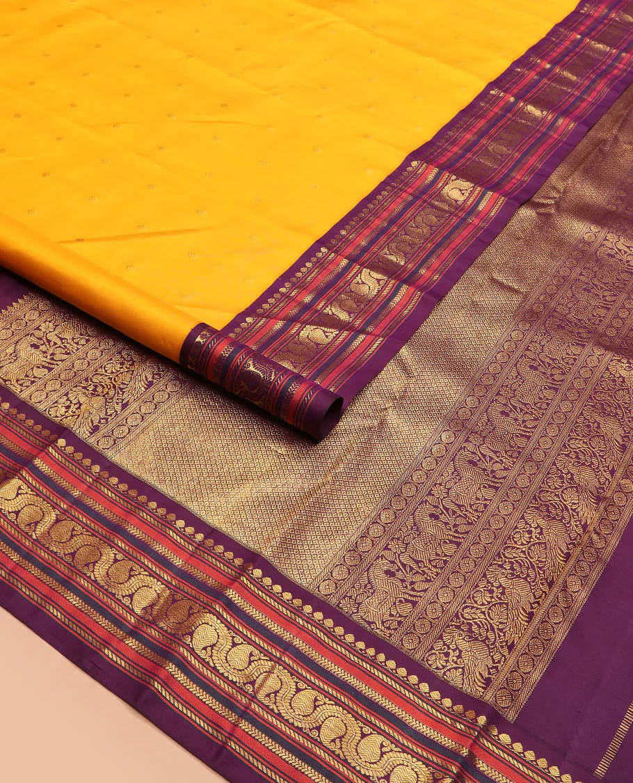Yellow zari buttas Kanchipuram silk saree, contrast border of thilakam mokku, banaras, kathir, and dhavana manga designs, and mayil kann design pallu - Image 2