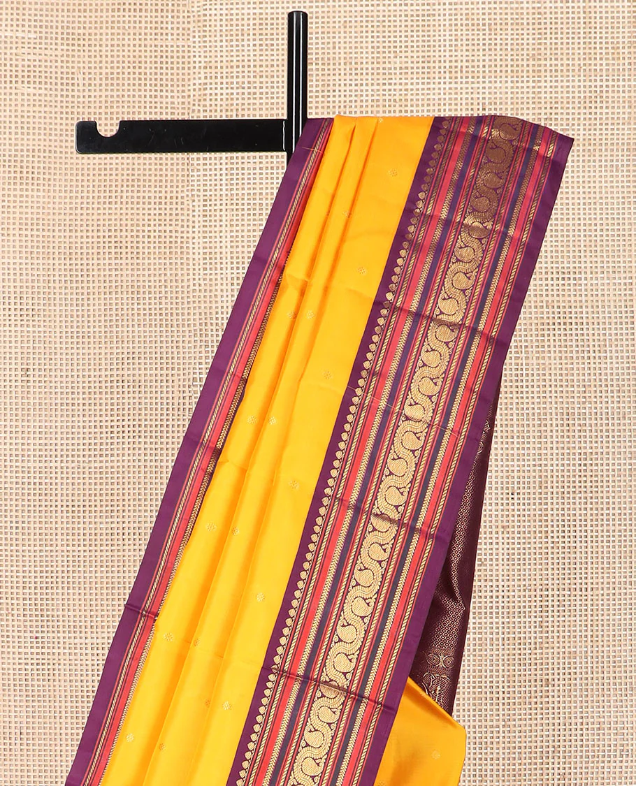 Yellow zari buttas Kanchipuram silk saree, contrast border of thilakam mokku, banaras, kathir, and dhavana manga designs, and mayil kann design pallu - Image 3