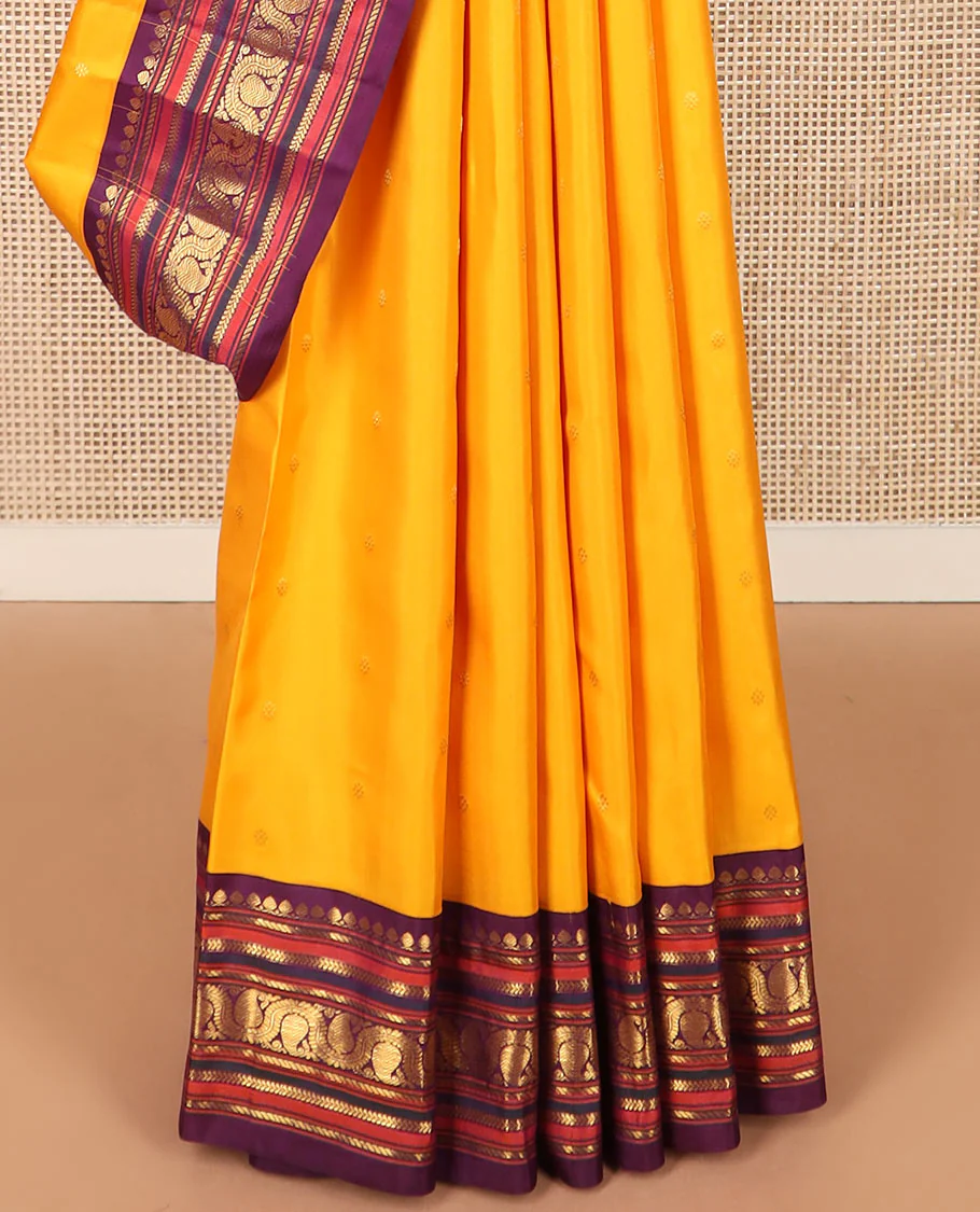 Yellow zari buttas Kanchipuram silk saree, contrast border of thilakam mokku, banaras, kathir, and dhavana manga designs, and mayil kann design pallu - Image 4