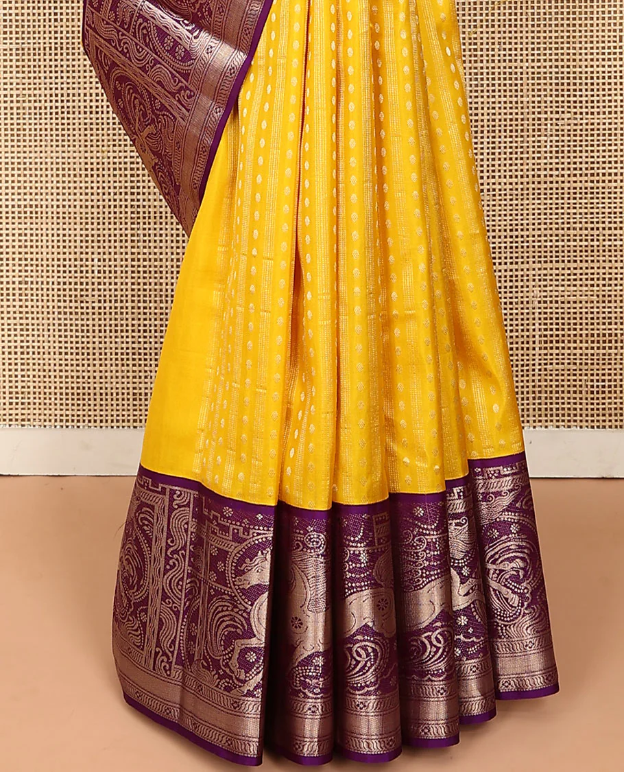 Yellow zari buttas Vasundhara silk saree, contrast border of kuthirai designs, and pallu of intricate designs - Image 4