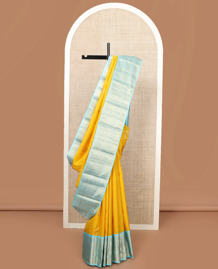Yellow zari buttas Vasundhara silk saree, contrast border of rekku, muthu, kodi manga, kodi visiry, mayil kann, and rudraksham designs, and jaal pallu - Image 2