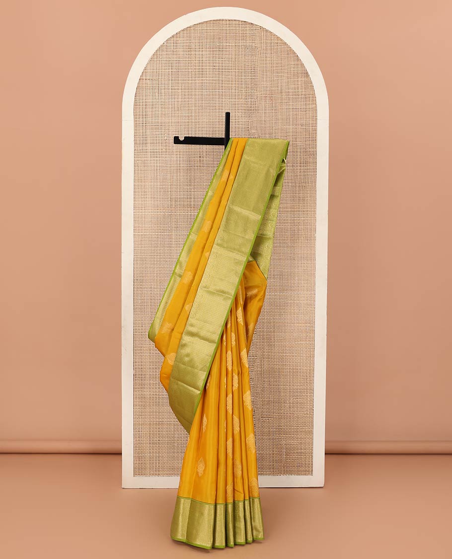 Yellow zari buttas Vasundhara Lite Silk Mix Saree, contrast border of muthu, mayil, kamalam, jaal designs, and pallu of kodi visiry designs