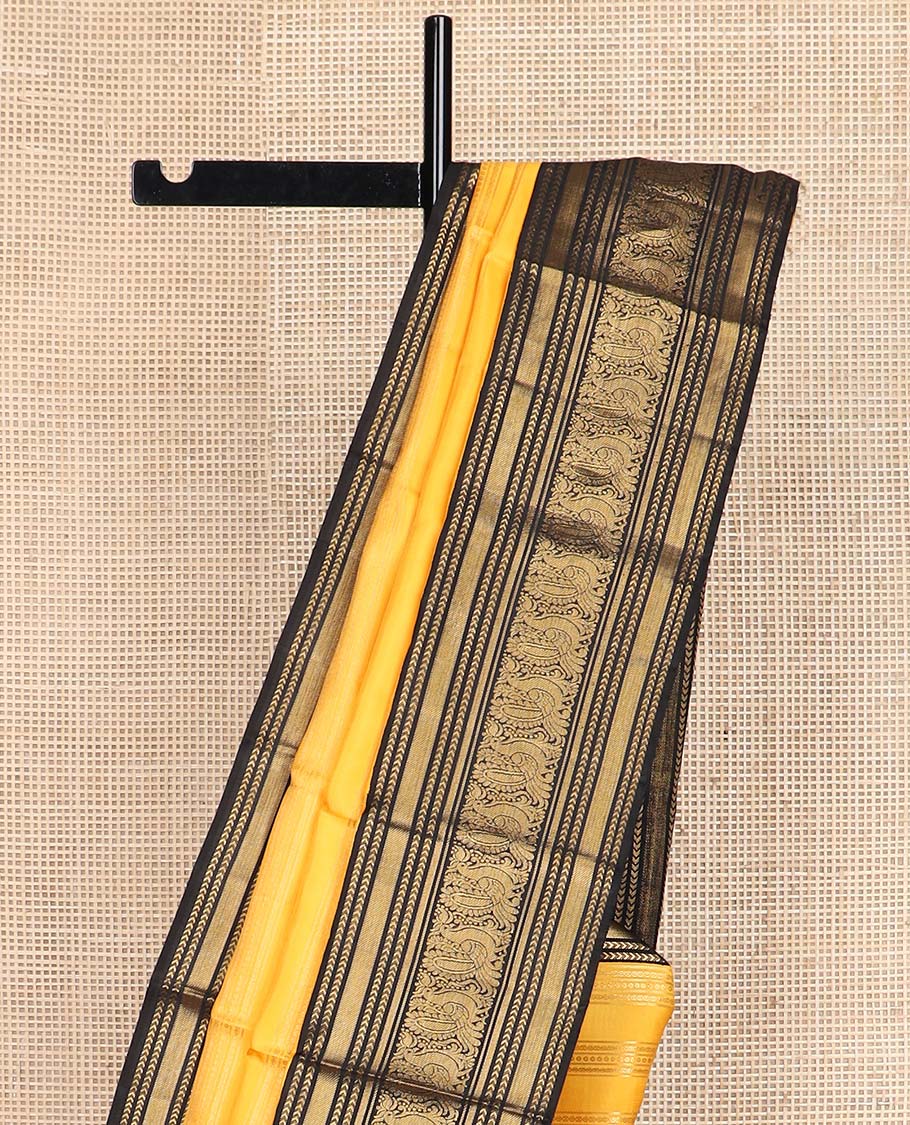 Yellow zari striped Kanchipuram silksaree, contrast border of kathir, and mayil designs, and pallu of mayil kann designs - Image 6